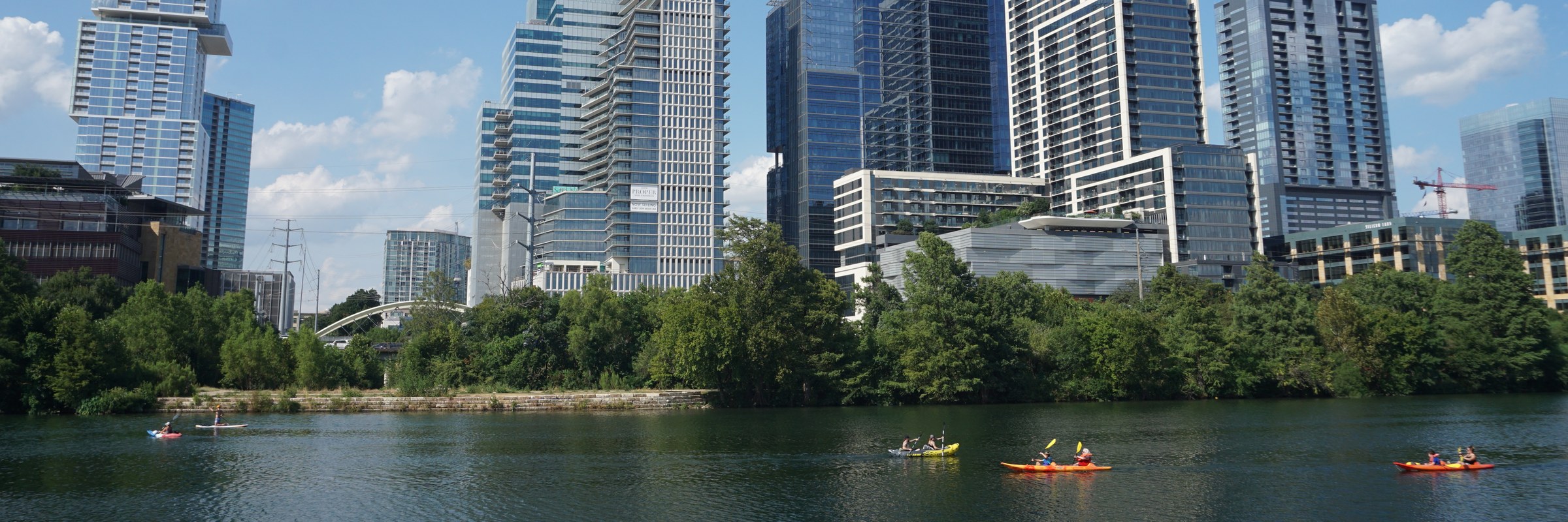 Downtown Austin from Lady Bird Lake: Congress Avenue Bridge, Frost Bank Tower, The Independent